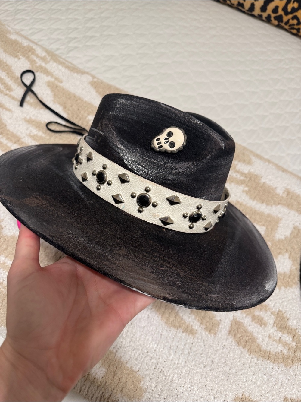 Art by Amy Labbe custom painted hat with band and skull hat pin
